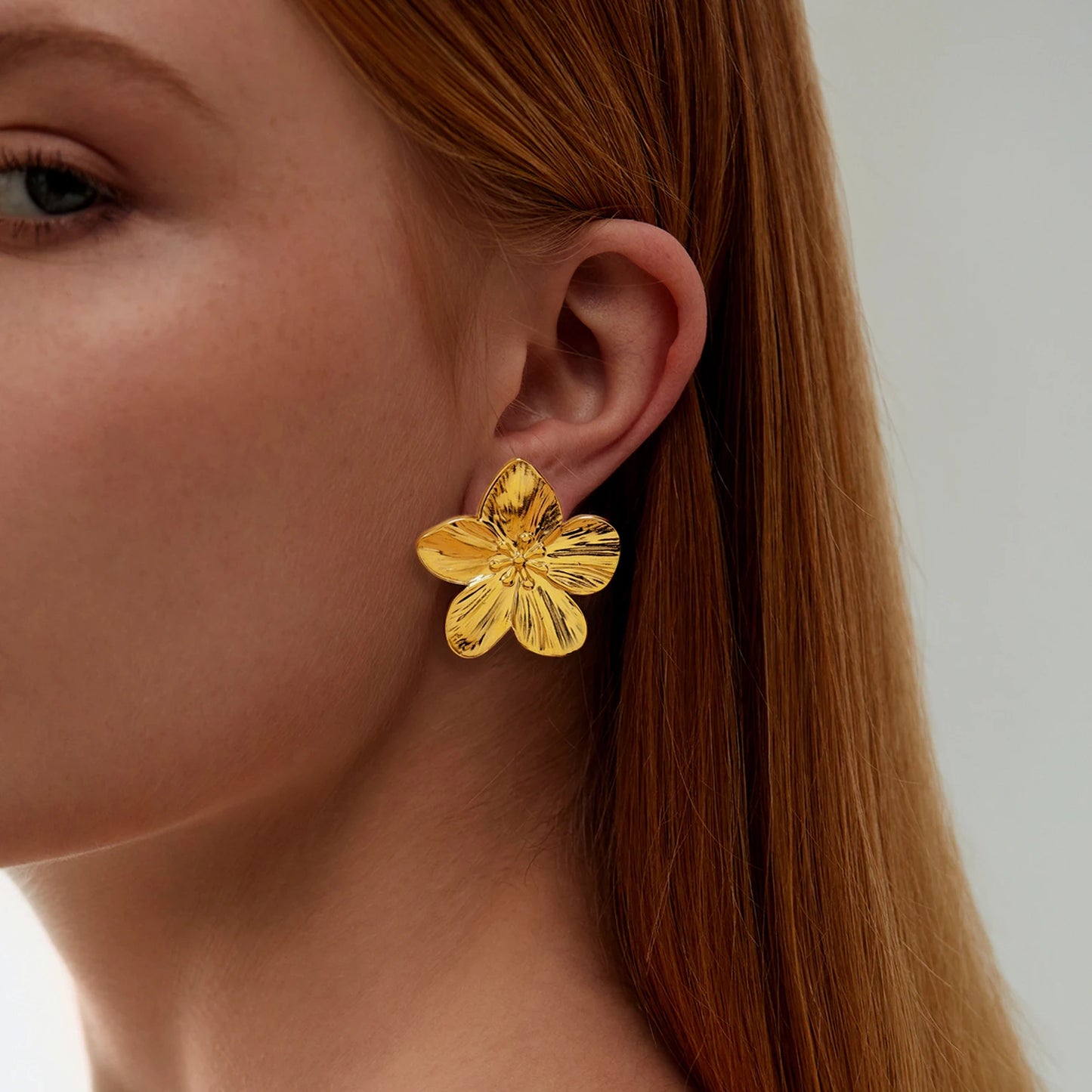 Boucle d'oreille Fleur d'or